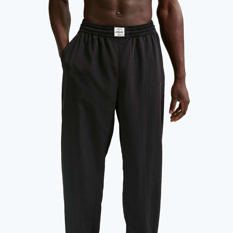 Мъжки панталони за бягане Nike N.A.C. Dri-Fit Woven black/pale ivory/black 4