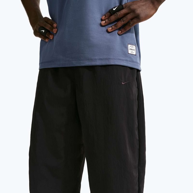 Мъжки панталони за бягане Nike N.A.C. Dri-Fit Woven black/pale ivory/black 5